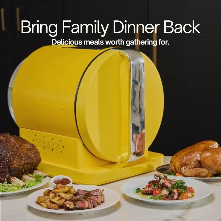 “Yellow Agari Smart Cooker on a kitchen counter surrounded by plated roast, chicken, and prepared dishes.”